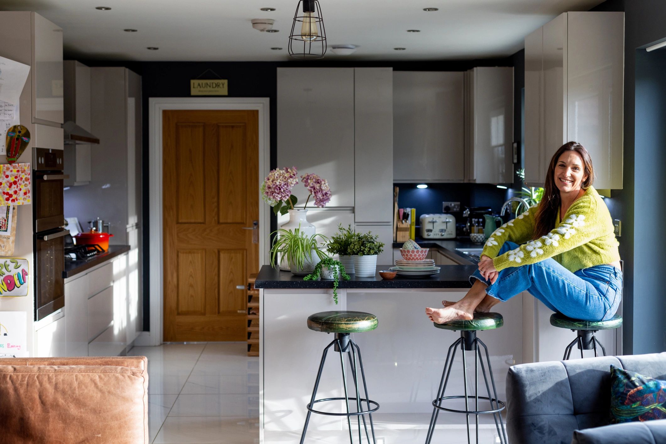 Featured happy customer in modern kitchen