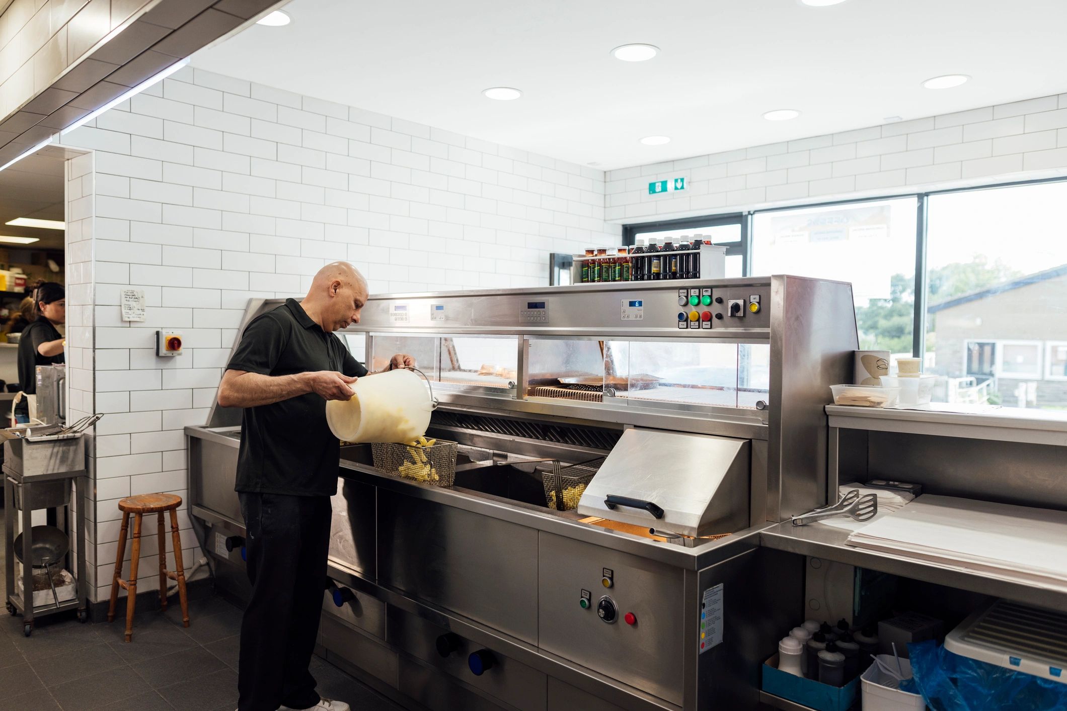 Technician working with kitchen equipment